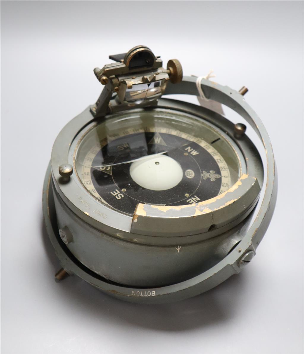 A ships compass with attached gimbal